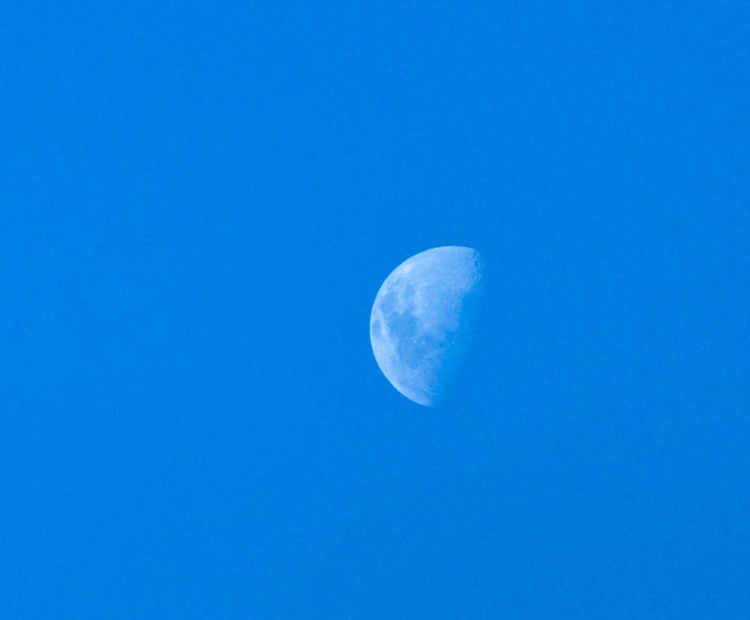 The moon in an all-day sky